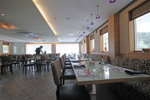 Hotel Ashraya International 5