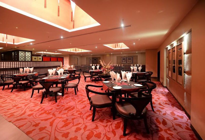 Hotel Oyo Premium Ramavarappadu Circle 11