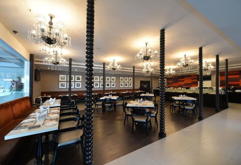 Hotel Oyo Premium Ramavarappadu Circle 12