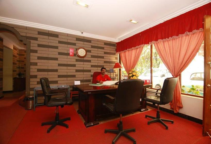 Hotel Oyo Premium Am Road Near Tata Tea Ground 1