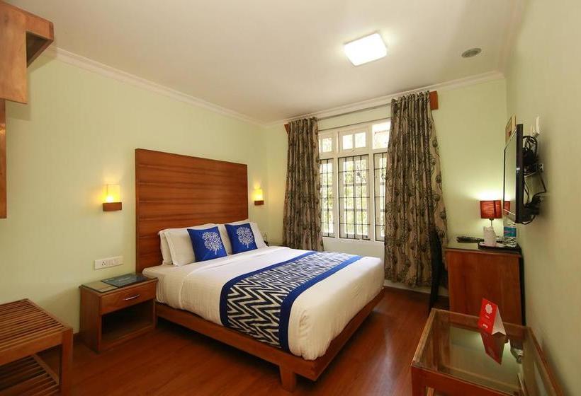 Hotel Oyo Premium Am Road Near Tata Tea Ground 4