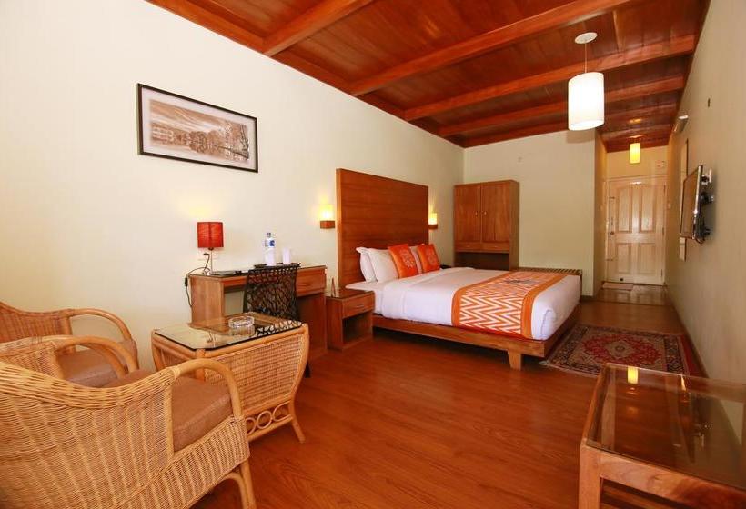 Hotel Oyo Premium Am Road Near Tata Tea Ground 7