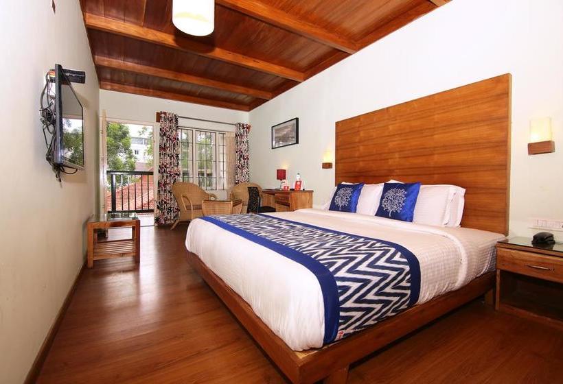 Hotel Oyo Premium Am Road Near Tata Tea Ground 9