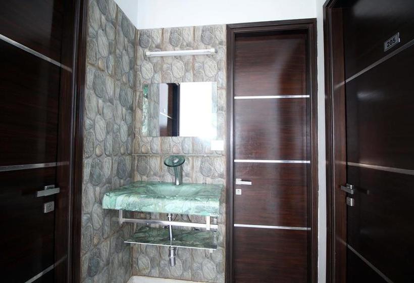 Divine Residency By Royal Collection Hotels 12