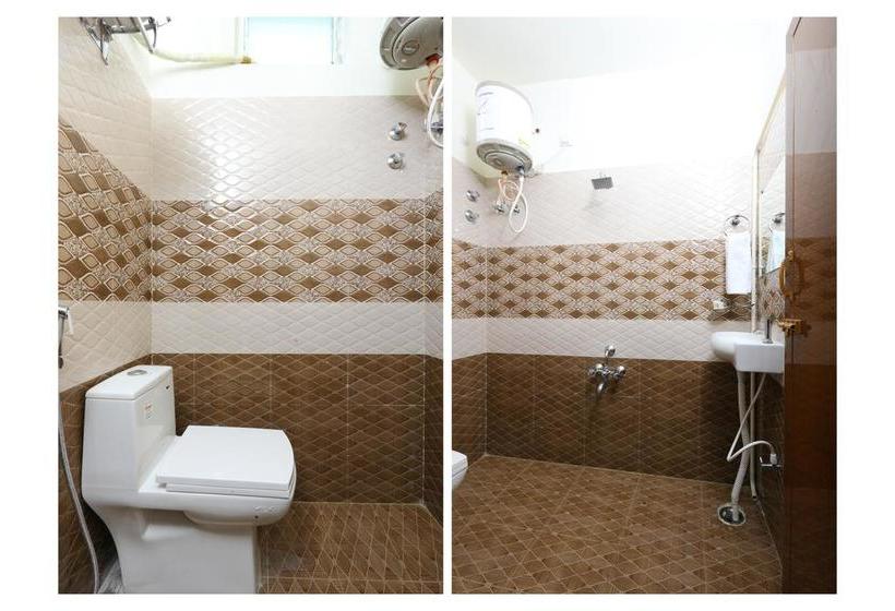 Hotel Oyo 10701 Moukthi Apartment 12