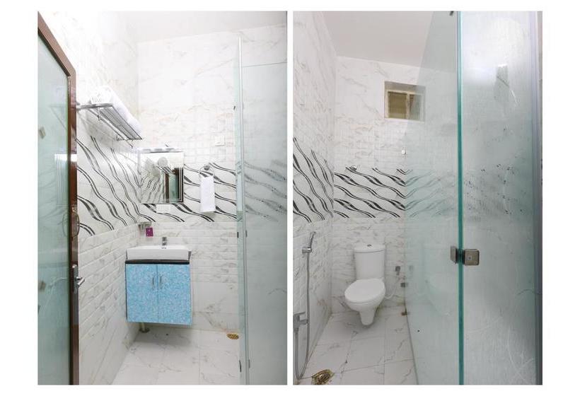 Hotel Oyo 10701 Moukthi Apartment 13