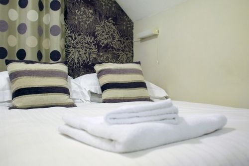 Pension (Hôtel basse catégorie) Camelot Guest House 11