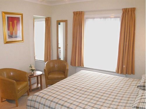 Pension (Hôtel basse catégorie) The Coach House 6